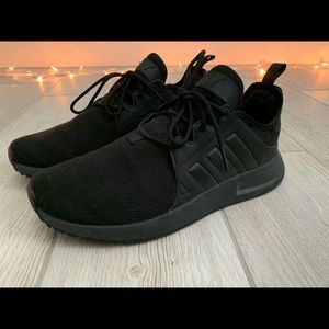 All black adida shoes